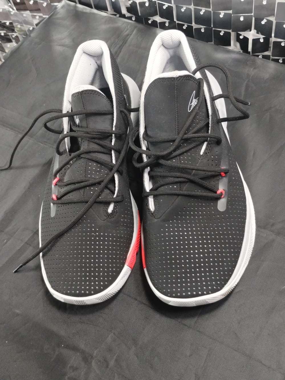 Under Armour Black Athletic Sneakers with White and Red Details